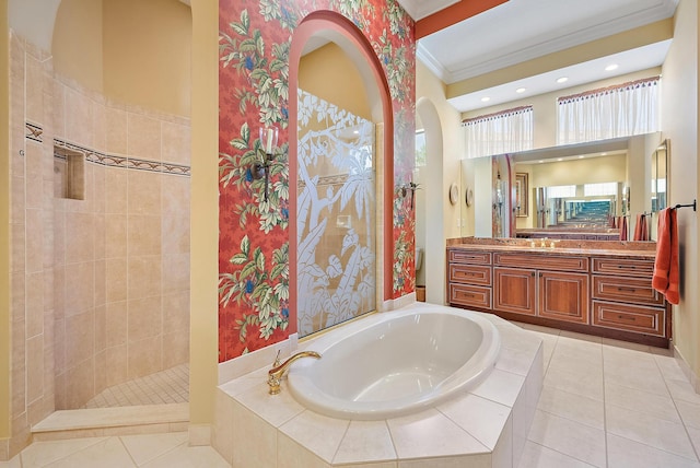 7731 Blue Heron Way, West Palm Beach, FL 33412 - full bathroom featuring crown molding, a bath, vanity, tile patterned flooring, and walk in shower