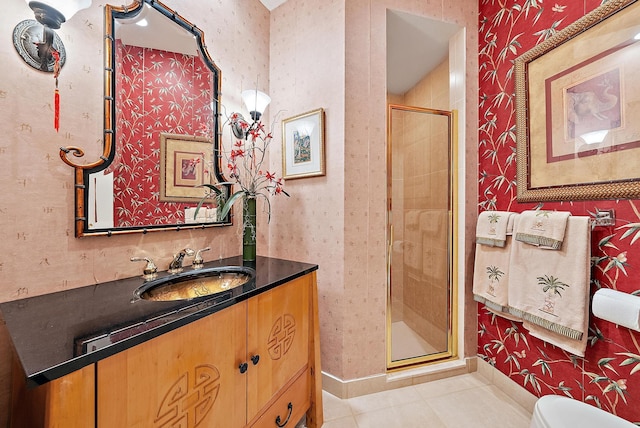 7731 Blue Heron Way, West Palm Beach, FL 33412 - full bathroom featuring wallpapered walls, a shower stall, tile patterned floors, vanity, and toilet