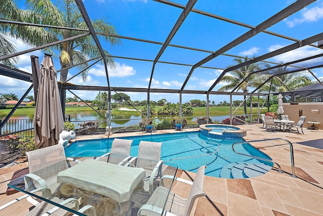 7731 Blue Heron Way, West Palm Beach, FL 33412 - view of swimming pool with a patio, a lanai, a water view, and a pool with connected hot tub
