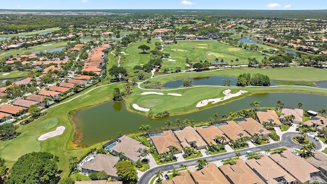 7731 Blue Heron Way, West Palm Beach, FL 33412 - aerial view of property's location with nearby suburban area, a golf course, and a large body of water