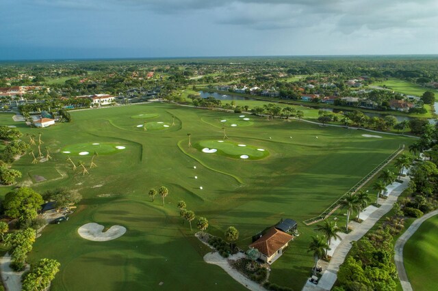7731 Blue Heron Way, West Palm Beach, FL 33412 - aerial view of property's location with a large body of water, a golf club, and nearby suburban area