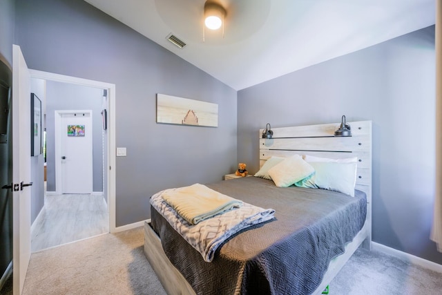 bedroom with lofted ceiling, carpet floors, baseboards, and a ceiling fan