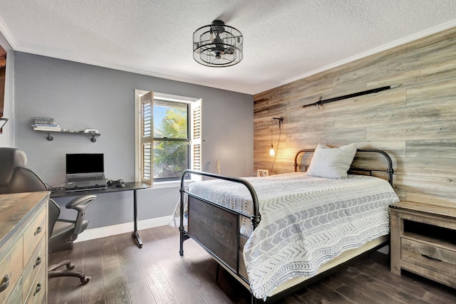 16888 W Downers Dr W, The Acreage, FL 33470 - bedroom featuring wood walls, an accent wall, an office area, wood finished floors, and a textured ceiling