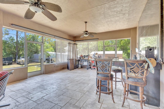 16888 W Downers Dr W, The Acreage, FL 33470 - sunroom with a ceiling fan and plenty of natural light