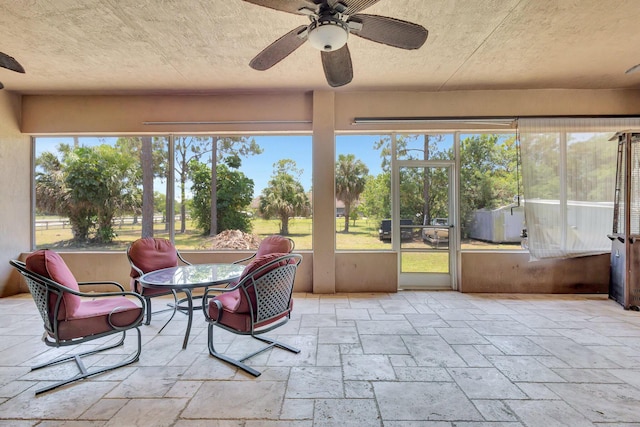 16888 W Downers Dr W, The Acreage, FL 33470 - sunroom with a ceiling fan and plenty of natural light
