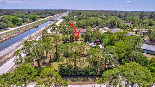 16888 W Downers Dr W, The Acreage, FL 33470 - aerial view of property and surrounding area featuring a nearby body of water