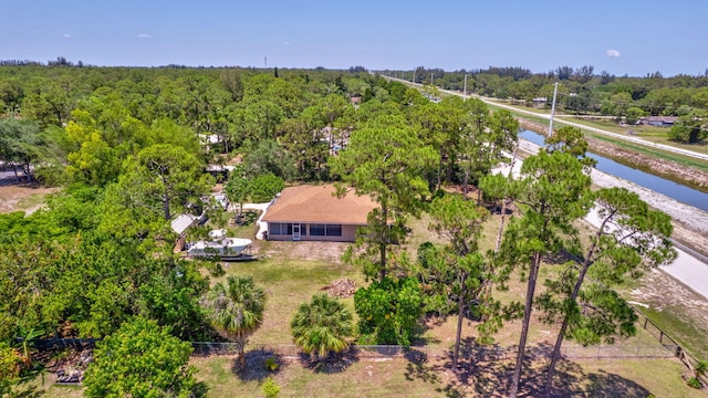 16888 W Downers Dr W, The Acreage, FL 33470 - view of subject property with a forest and a large body of water