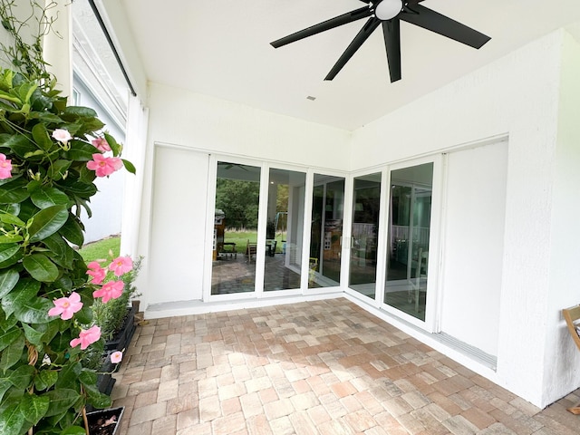 9865 SW Meridian Way, Stuart, FL 34997 - unfurnished sunroom with ceiling fan
