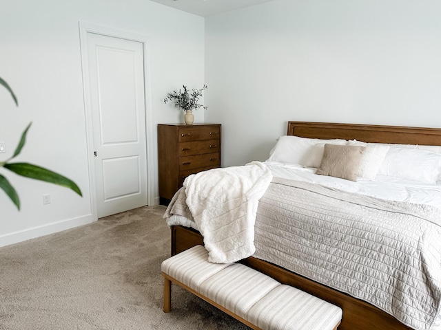 9865 SW Meridian Way, Stuart, FL 34997 - bedroom with light carpet and baseboards