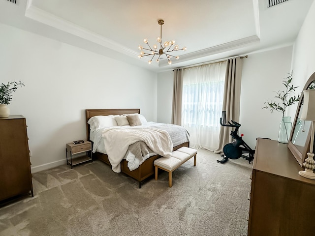 9865 SW Meridian Way, Stuart, FL 34997 - carpeted bedroom with a raised ceiling, ornamental molding, and a chandelier