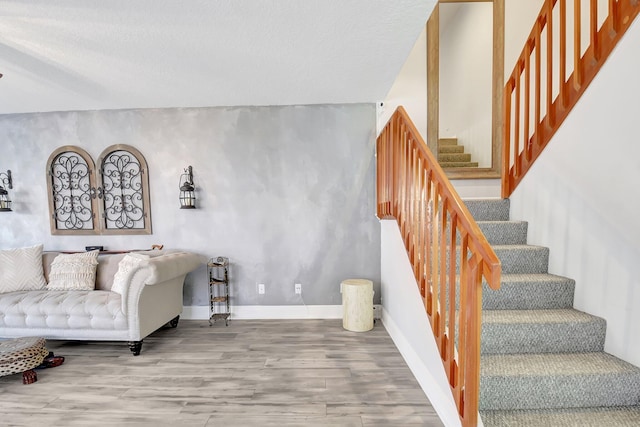 5201 Wheatley Ct, Boynton Beach, FL 33436 - living area with wood finished floors, stairs, and baseboards