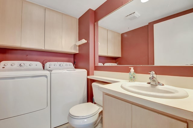 5201 Wheatley Ct, Boynton Beach, FL 33436 - half bath featuring washing machine and dryer, toilet, and vanity