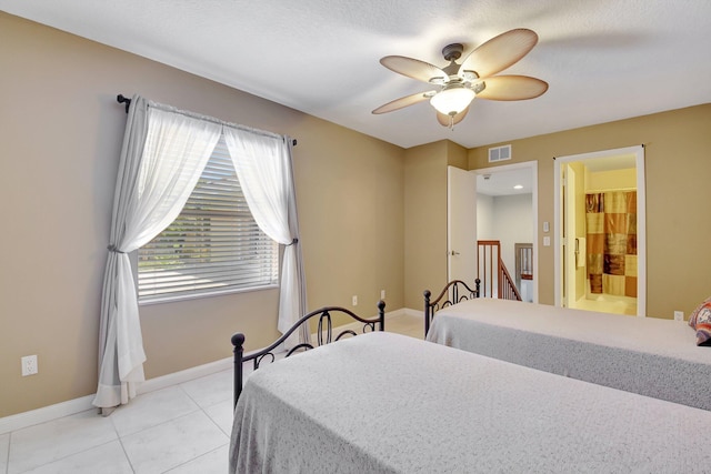 5201 Wheatley Ct, Boynton Beach, FL 33436 - bedroom featuring light tile patterned flooring, baseboards, ceiling fan, and connected bathroom