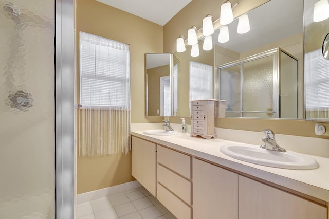 5201 Wheatley Ct, Boynton Beach, FL 33436 - full bathroom with a shower stall, double vanity, and tile patterned floors