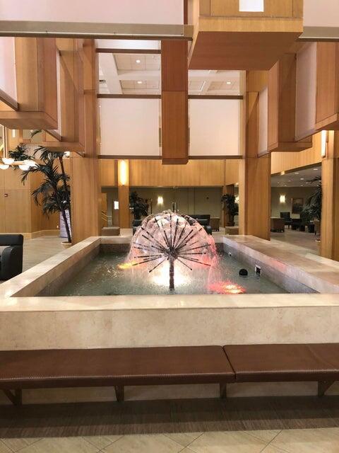 261 Suffolk Unit G, Boca Raton, FL 33434 - building lobby featuring a towering ceiling