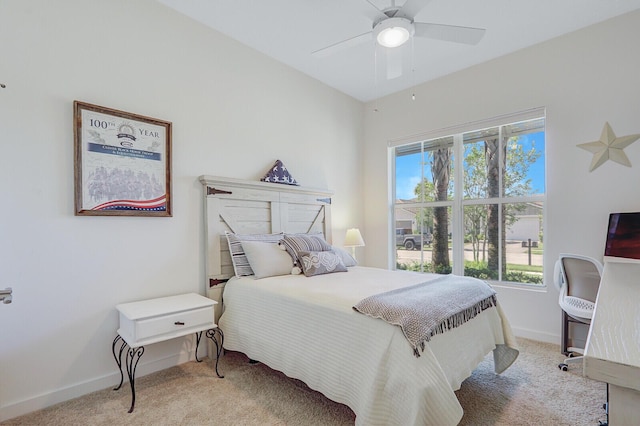 19579 Weathervane Way, The Acreage, FL 33470 - carpeted bedroom with multiple windows, baseboards, and ceiling fan