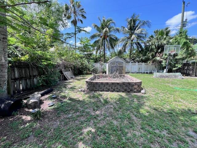 4928 Jefferson Rd, Delray Beach, FL 33445 - view of yard featuring a shed and an outdoor structure