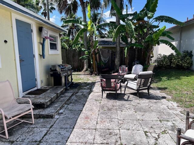 4928 Jefferson Rd, Delray Beach, FL 33445 - view of patio / terrace featuring fence and area for grilling