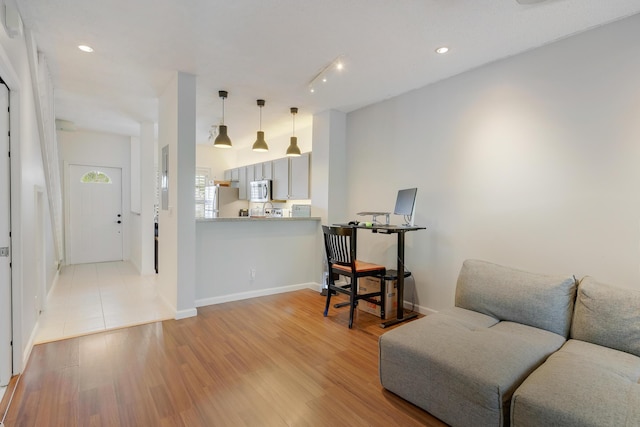 6936 Stoney Creek Cir, Lake Worth, FL 33467 - living room with light wood-style flooring, baseboards, and recessed lighting