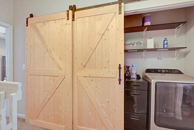 6936 Stoney Creek Cir, Lake Worth, FL 33467 - laundry area featuring washer / clothes dryer and a barn door
