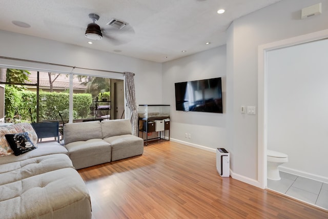 6936 Stoney Creek Cir, Lake Worth, FL 33467 - living area featuring light wood-style flooring, baseboards, recessed lighting, and a ceiling fan