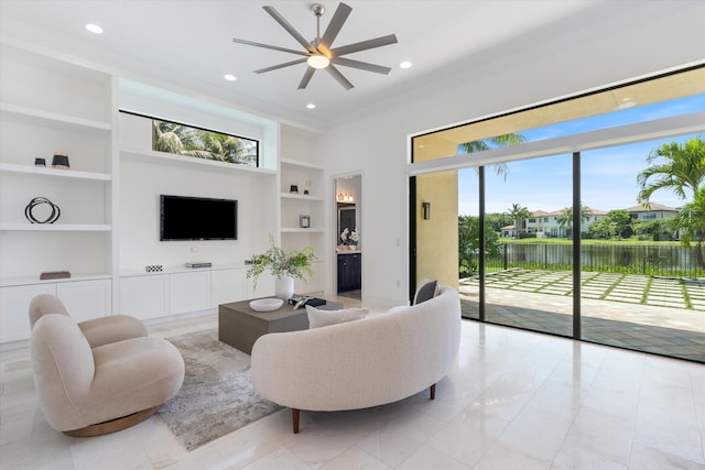 living room with built in features, plenty of natural light, ceiling fan, crown molding, and recessed lighting