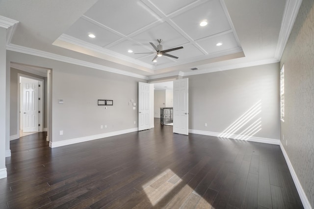 unfurnished living room featuring ceiling fan, coffered ceiling, baseboards, dark wood finished floors, and ornamental molding