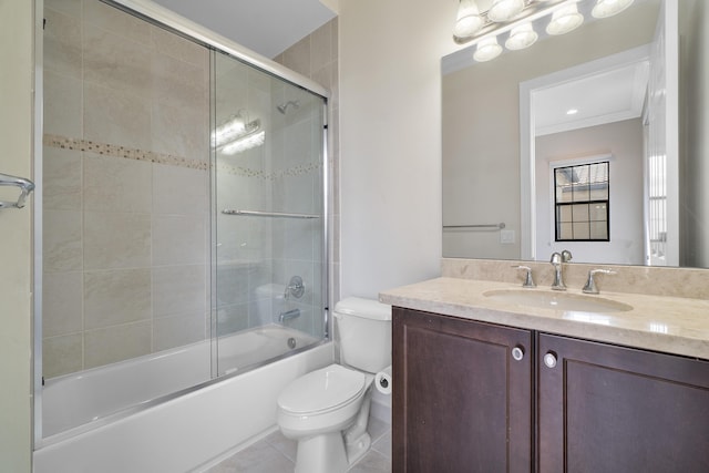 full bathroom featuring toilet, enclosed tub / shower combo, vanity, and tile patterned flooring