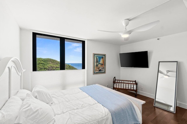250 S Ocean Blvd Unit 2H, Boca Raton, FL 33432 - bedroom featuring dark wood-style flooring, a ceiling fan, and baseboards