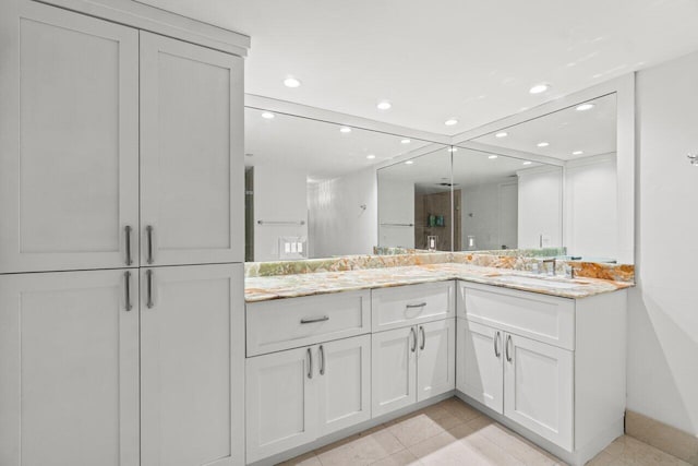 250 S Ocean Blvd Unit 2H, Boca Raton, FL 33432 - bathroom with recessed lighting, vanity, a stall shower, tile patterned floors, and baseboards