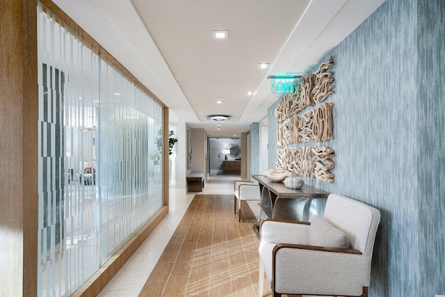 250 S Ocean Blvd Unit 2H, Boca Raton, FL 33432 - corridor with wallpapered walls and tile patterned flooring