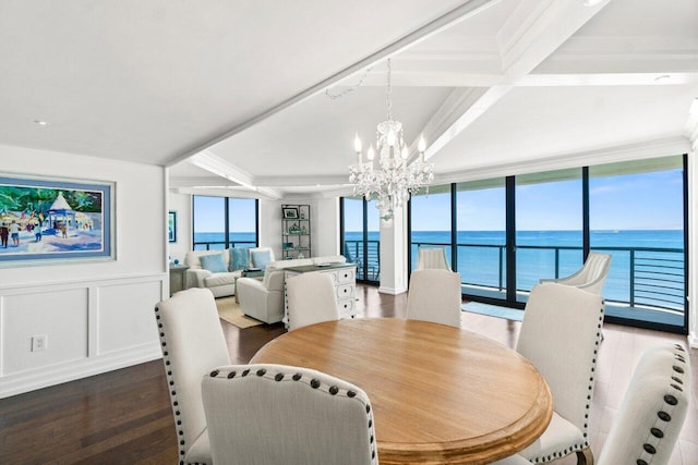250 S Ocean Blvd Unit 2H, Boca Raton, FL 33432 - dining area with a chandelier, wood finished floors, a water view, wainscoting, and a decorative wall