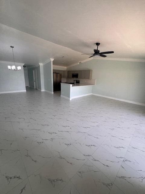 21 Walcott Dr, Boynton Beach, FL 33426 - unfurnished living room with ornamental molding, baseboards, a ceiling fan, a chandelier, and marble finish flooring