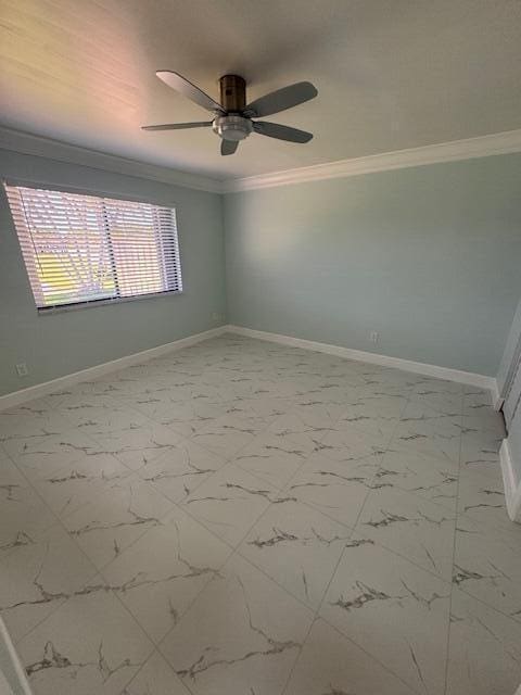 21 Walcott Dr, Boynton Beach, FL 33426 - unfurnished room with crown molding, marble look tiles, ceiling fan, and baseboards