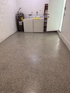 21 Walcott Dr, Boynton Beach, FL 33426 - clothes washing area featuring washer and clothes dryer and electric water heater