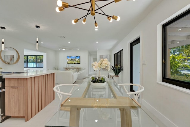 2924 NW 6th Ave, Wilton Manors, FL 33311 - dining space featuring a chandelier and recessed lighting