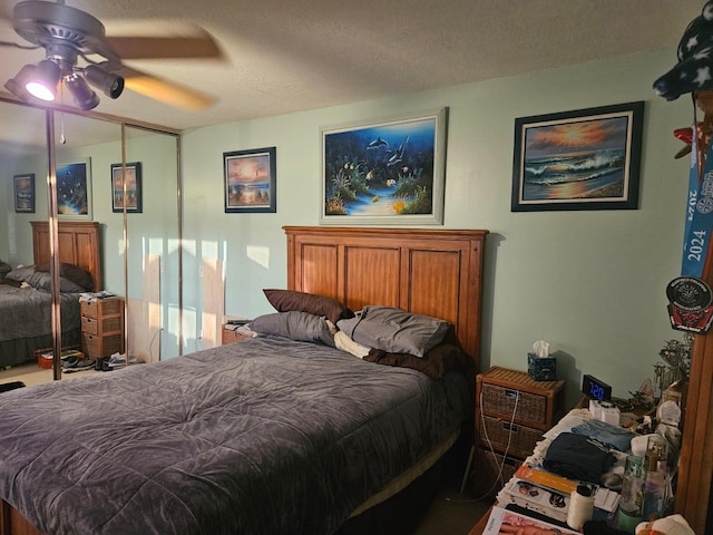 24 Bedford Ct Unit A, Royal Palm Beach, FL 33411 - bedroom featuring a ceiling fan and a closet