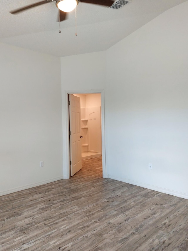 1614 SW Sylvester Ln, Port Saint Lucie, FL 34984 - empty room with ceiling fan, wood finished floors, and baseboards