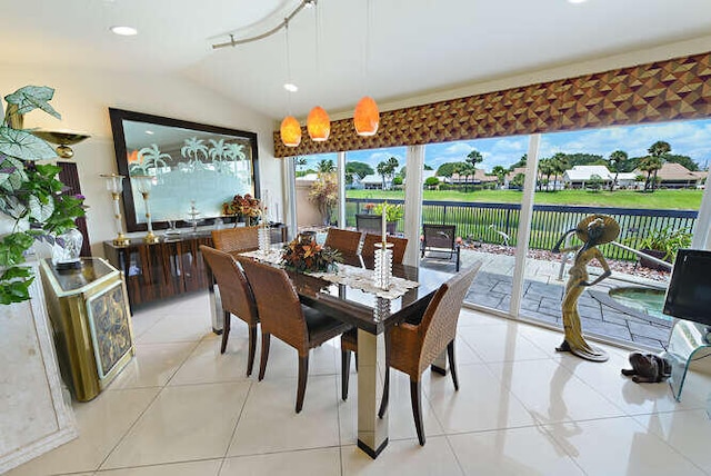 150 Beach Summit Ct, Jupiter, FL 33477 - dining space with lofted ceiling, light tile patterned floors, and recessed lighting