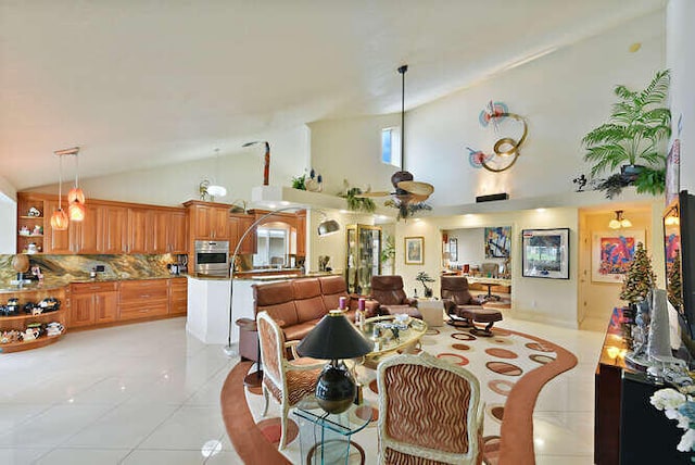 150 Beach Summit Ct, Jupiter, FL 33477 - dining space with high vaulted ceiling and light tile patterned floors