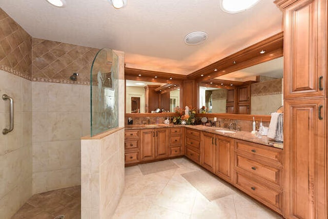 150 Beach Summit Ct, Jupiter, FL 33477 - bathroom with a walk in shower, double vanity, tile patterned floors, and recessed lighting