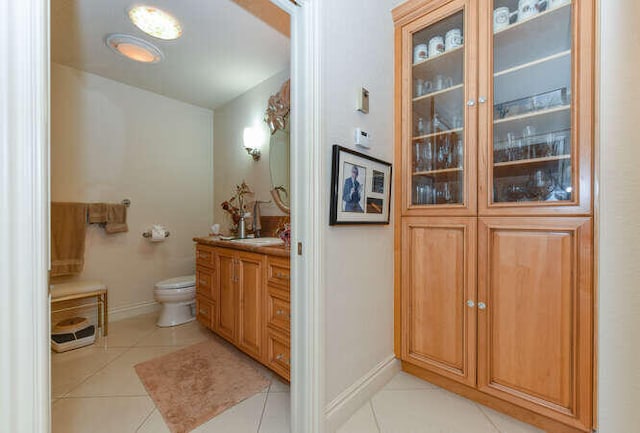 150 Beach Summit Ct, Jupiter, FL 33477 - bathroom with vanity, tile patterned flooring, baseboards, and toilet