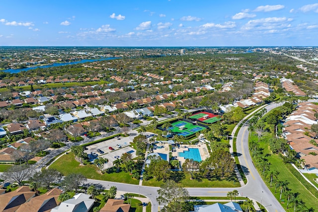 150 Beach Summit Ct, Jupiter, FL 33477 - aerial view of property and surrounding area featuring a large body of water, nearby suburban area, and a pool