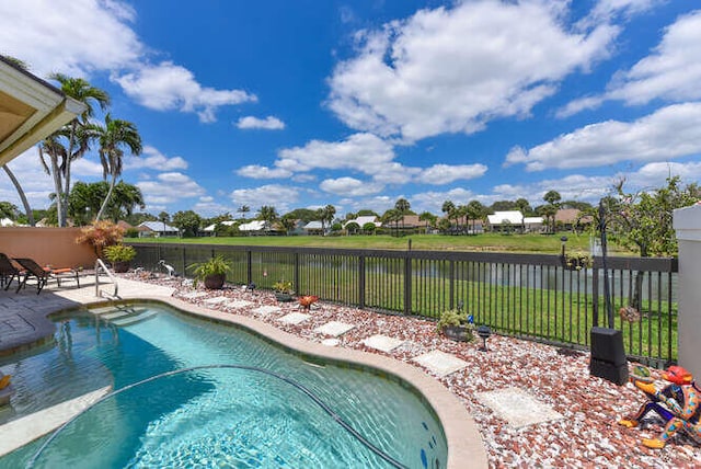 150 Beach Summit Ct, Jupiter, FL 33477 - view of pool with a fenced backyard, a patio area, and a water view