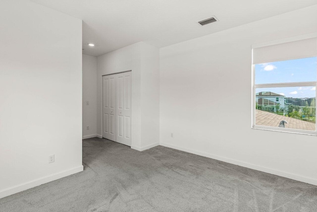 19659 Rugged Trunk Trl, Loxahatchee, FL 33470 - carpeted spare room with baseboards and recessed lighting