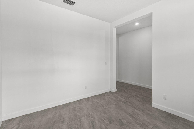 19659 Rugged Trunk Trl, Loxahatchee, FL 33470 - empty room with recessed lighting and baseboards