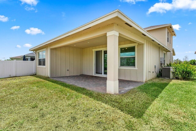 19659 Rugged Trunk Trl, Loxahatchee, FL 33470 - rear view of house featuring a patio area and cooling unit