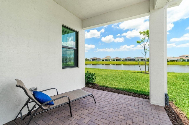 4817 Saint Armands Way, Westlake, FL 33470 - view of patio / terrace with a water view and a residential view