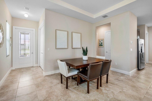 4817 Saint Armands Way, Westlake, FL 33470 - dining area featuring baseboards and light tile patterned flooring