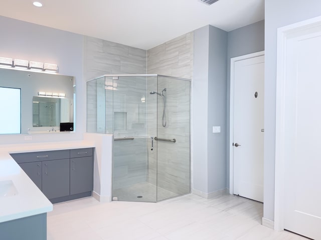 8803 Skyward St, Boca Raton, FL 33496 - bathroom featuring vanity, a stall shower, baseboards, and recessed lighting